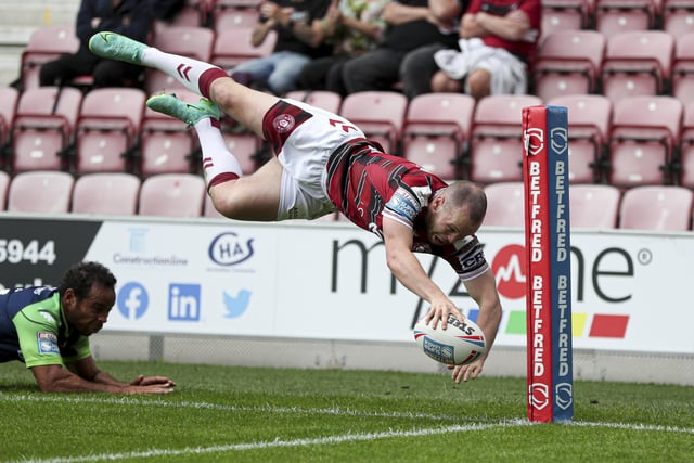Marshall goes over with a diving effort against Huddersfield.