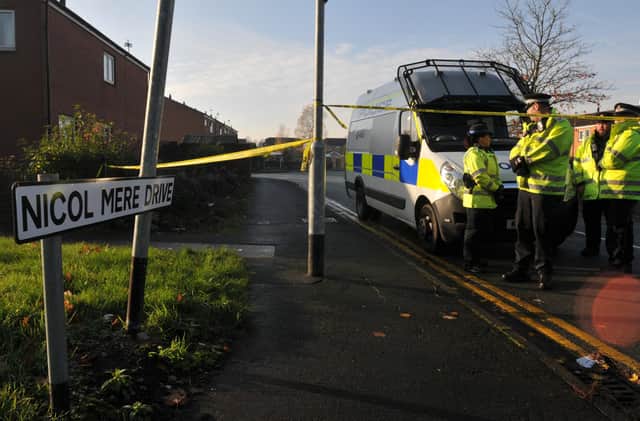 Police at the scene of the incident at Nicol Mere Drive, Ashton-in-Makerfield, in November 2017
