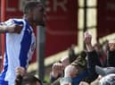 Skipper Tendayi Darikwa enjoys Latics' third goal