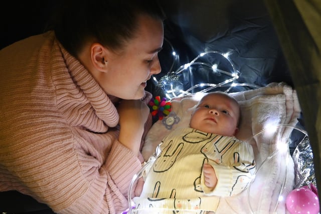 Sadie Aldred with 10-week-old Elsie in the new sensory room at Hindley Library and Community Centre