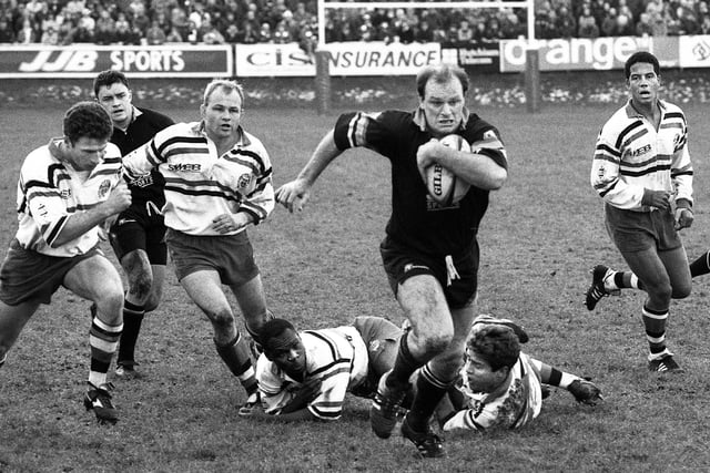 Orrell full-back Simon Langford races clear of the Bath cover including Jeremy Guscott, right, on his way to the try line in the Pilkington Cup round 5 match at Edge Hall Road on 28th of January 1995. Orrell lost 19-25.