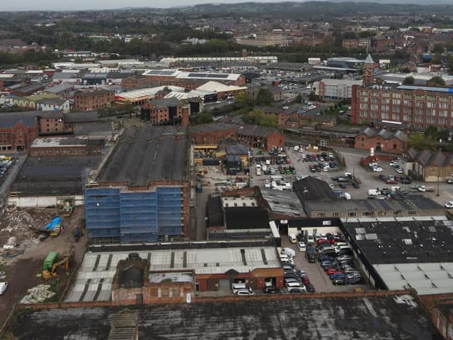 Mill no1 at Eckersley's Mills cloaked in scaffolding.Trencherfield Mill can be seen top right