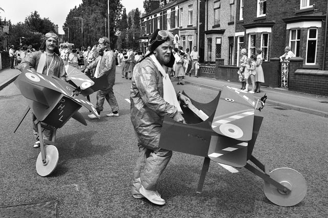 The Red Barrows in formation in the Ashton Carnival parade on Saturday 14th of June 1986.