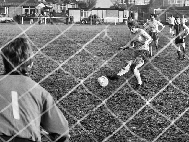 Sid Wallace scores from the penalty spot with one of his 4 goals for the Post and Chronicle Sunday League against Oldham Sunday League in the Lancashire Inter League Tourney quarter-final at Ashton Town's ground on Sunday 21st of December 1980. The Post League won in a competition record win 11-2.
