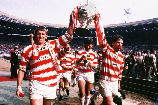 Captain Graeme West and Brian Dunn parade the trophy after the Challenge Cup Final at Wembley on Saturday 4th of May 1985 which Wigan won 28-24.
