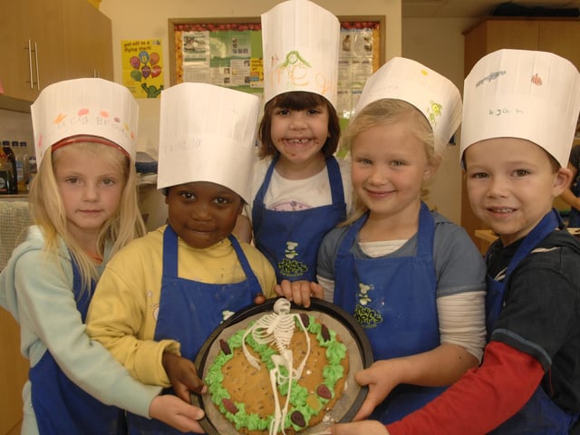 Youngsters at Ince Children's Centre, Pickup Street, Ince, took part in half-term cookery sessions making Hallowe'en Cakes. Pictured are (left to right): Lucy, Tawana, Megan, Kacey and Ryan
