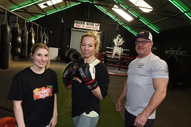 from left, Maddie Cullin, Hayley Rushton and Paul Rushton. 
Reps and Rounds Fitness, Standish, have renovated and extended their gym and now have more equipment, boxing ring and training area and a hair salon.