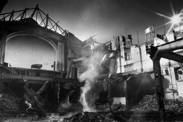 A piano still stands on the stage in the middle of the demolition of Wigan Casino in 1983 as a poignant reminder of its musical past.