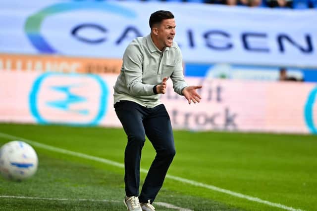 Gary Caldwell tries to get his message across against Stockport