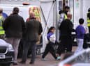 Detainees are seen inside the Manston holding centre for asylum seekers. Immigration minister Robert Jenrick this week vowed "more radical" policies to counter illegal migration.
