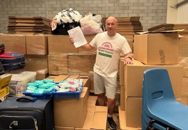 Dave Armstrong with some of the aid bound for Africa