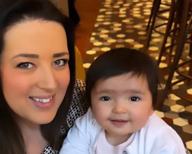 Emily Boghal with her daughter Aurelia whom she struggles to care for because of her back pain