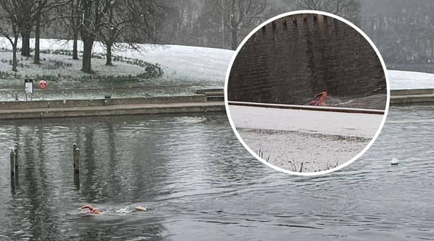A man was caught on video swimming in Roundhay Park's Waterloo Lake in Leeds during freezing temperatures and warnings in place for snow.