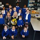 Executive Headteacher Sue Darbyshire, centre right, with pupils at the school and  Cath Pealing, Wigan Council director education (centre left).