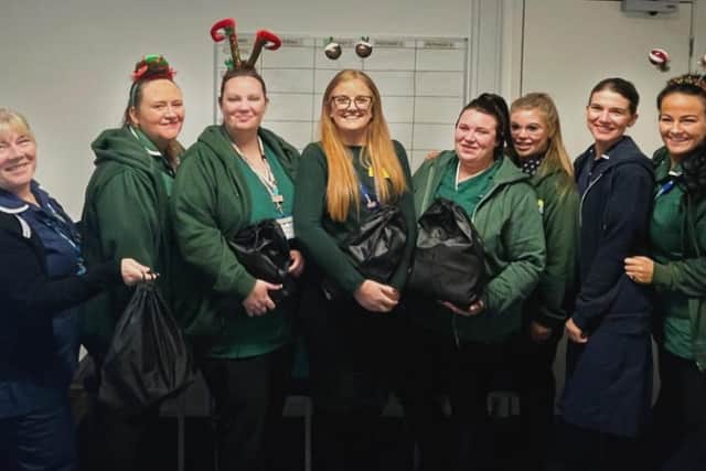 Kate Davenport (fourth from left) with the Discharge Team and Bridging Bags