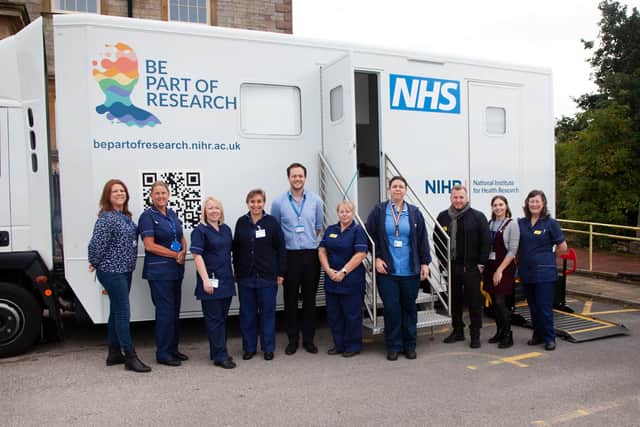 Members of the Research Team with themobile Greater Manchester Research Van that will be at the event
