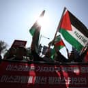 Protesters gather in support of the Palestinian people during a rally for Gaza on Wednesday in Seoul, South Korea