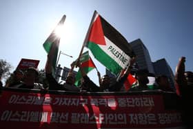 Protesters gather in support of the Palestinian people during a rally for Gaza on Wednesday in Seoul, South Korea