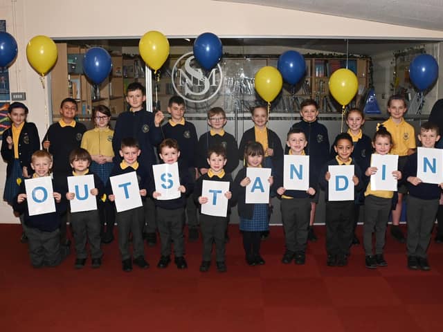 Pupils at Nicol Mere Primary School celebrate an "outstanding" Ofsted report