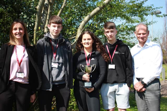 The winning team pictured with business studies teacher, Sarah Ryder, and Nick Wylie (Managing Director of Allied Finance)
