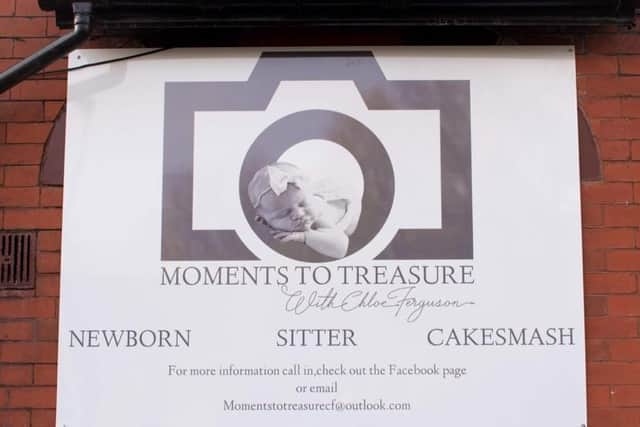 Chloe's photography studio business sign for Moments to Treasure.