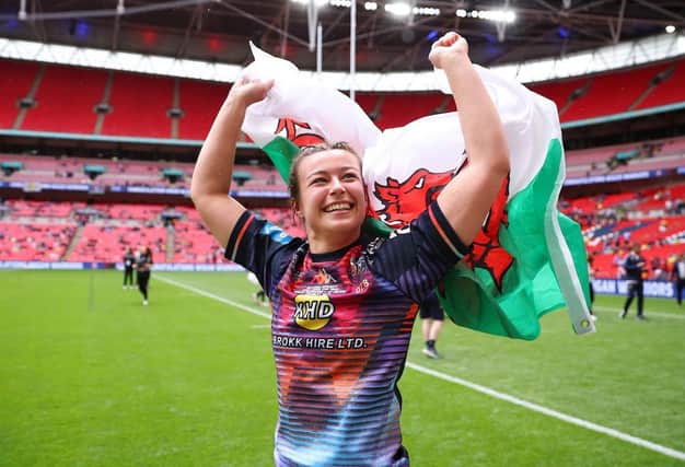 Wales international Carys Marsh celebrates Wigan Warriors' Challenge Cup win at Wembley Stadium