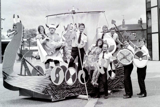 Retro 1981 - Wigan's firefighters launch their Viking themed raft ready for the summer raft races