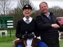 Fund-raising golfers Vicki Handley - a retired mounted police officer - and Jed Turner