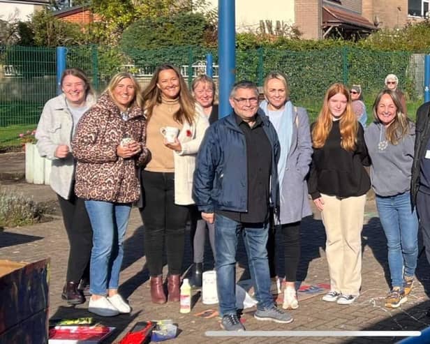 Student Freya Southworth, third from right, on one of the engagements during her day with Coun Chris Ready, centre