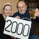 Cider enthusiast Roger Lowe, has enjoyed over 2000 different English ciders and made tasting notes on each.  Pictured with Sharon Williams, left, a member of the bar staff at Wigan Central where he enjoys a drink every Tuesday