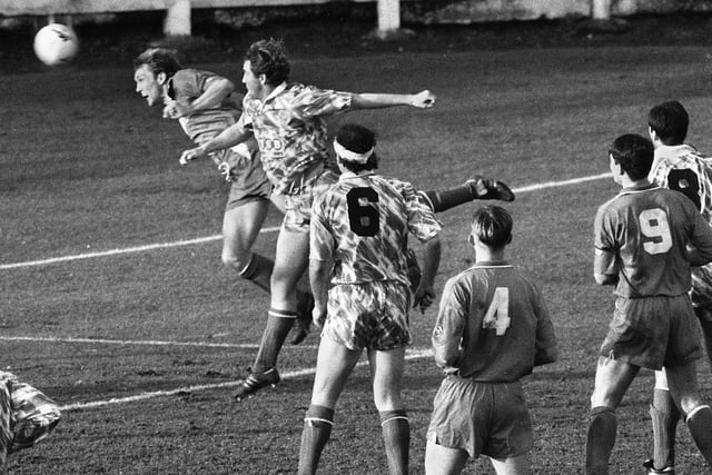 Wigan Athletic central defender Peter Skipper powers home a header against Brighton and Hove Albion in a 3rd division match at Springfield Park on Saturday 27th of February 1993.  Latics lost 1-2.