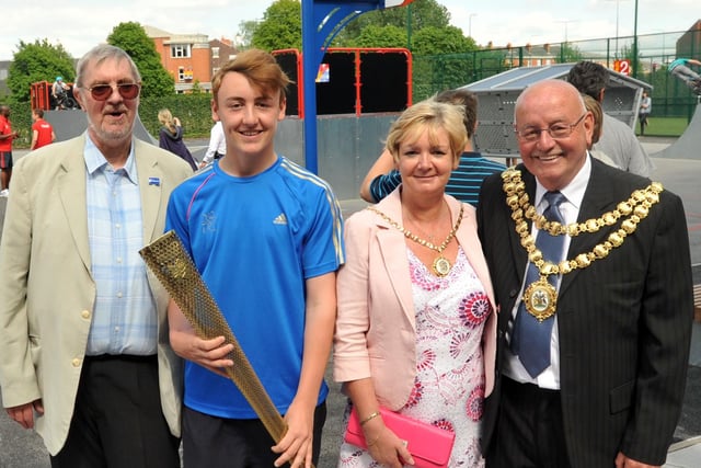 from left, Honorary president Lord Peter Smith, Olympic Torch bearer Cameron Foster, Mayoress of Wigan Janet Lumley and Mayor of Wigan councillor Billy Rotherham, view the skatepark as they look around the facilities.