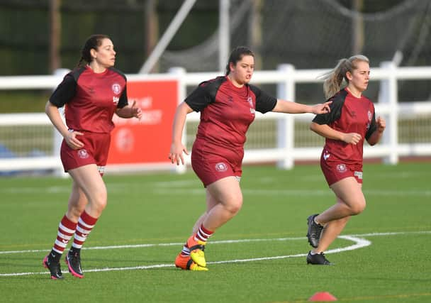 Olivia Harborow (right) has played a number of sports before rugby league