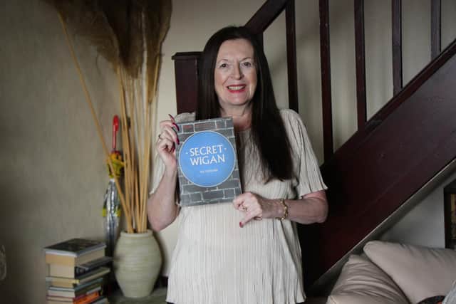 Author Sarah Gerrard with her latest release called Secret Wigan