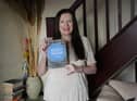 Author Sarah Gerrard with her latest release called Secret Wigan