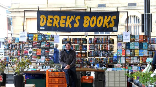 Derek Walsh on Derek's Books stall, Preston Market
