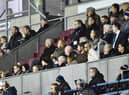 Muhammad Mokaev watches on as Wigan Warriors take on Salford at the DW Stadium