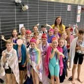 Children celebrate with councillors Chris Ready and Laura Flynn