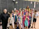 Children celebrate with councillors Chris Ready and Laura Flynn