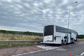 The coach is on the hard shoulder of the M6