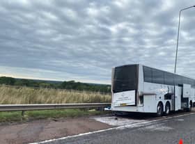The coach is on the hard shoulder of the M6