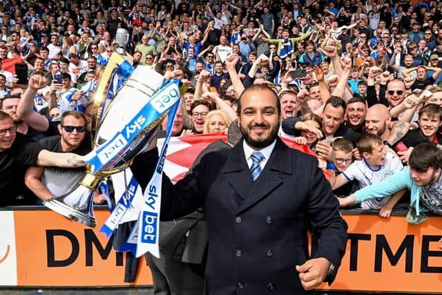 Talal Al Hammad with the League One trophy