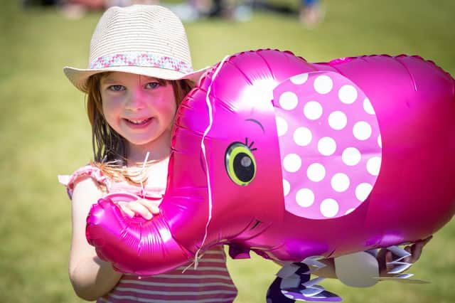 Lily Anderton with a balloon