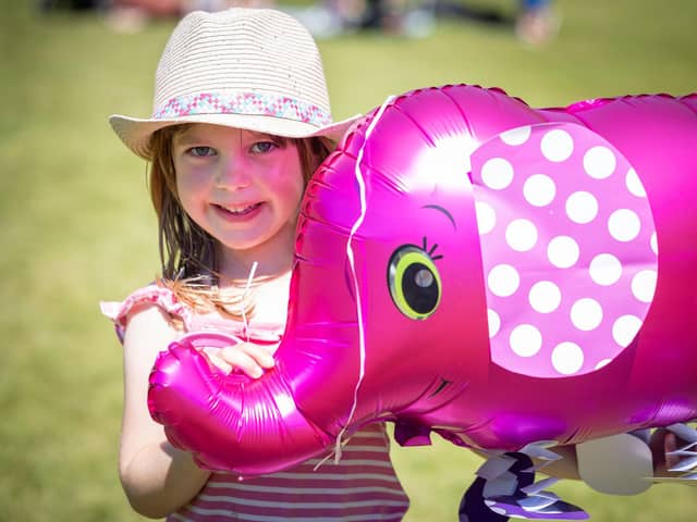 Lily Anderton with a balloon