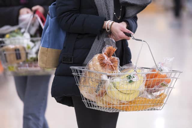 Supermarkets reported busier-than-usual trading on Sunday as shoppers anticipated Monday closures