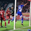 Dale Taylor tries to get on the end of a cross at Crawley