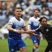 Max Power gets to grips with Joe Allen in the engine room