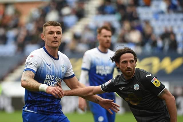 Max Power gets to grips with Joe Allen in the engine room