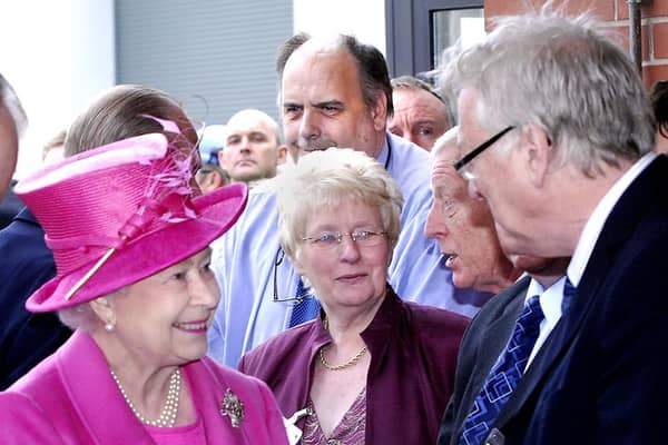 The Queen meets Heinz staff as she makes her tour.