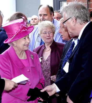 The Queen meets Heinz staff as she makes her tour.